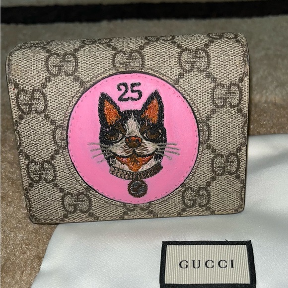 PRICE DROP!!
$300
(was $395)
Gucci 25th GG Supreme Bosco Wallet. - Picture 3 of 16